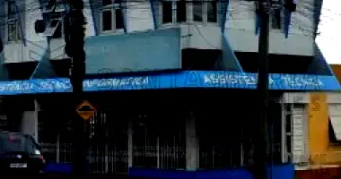 Prédio Comercial e Residencial com 4 Dormitórios em Alegrete/RS