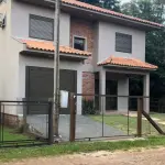 Imóvel com piscina no Balneário Londero