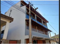Terreno 200m² com galpão e apartamento em Astolfo Dutra - MG