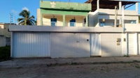 Casa com 4 quartos, 5 banheiros e 182 m² de área construída, ocupada