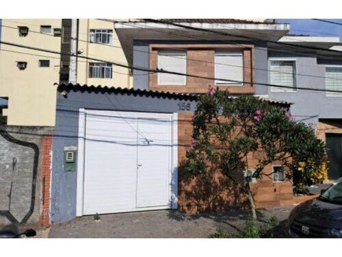 Casa Ocupada em Ponta da Praia, Santos/SP