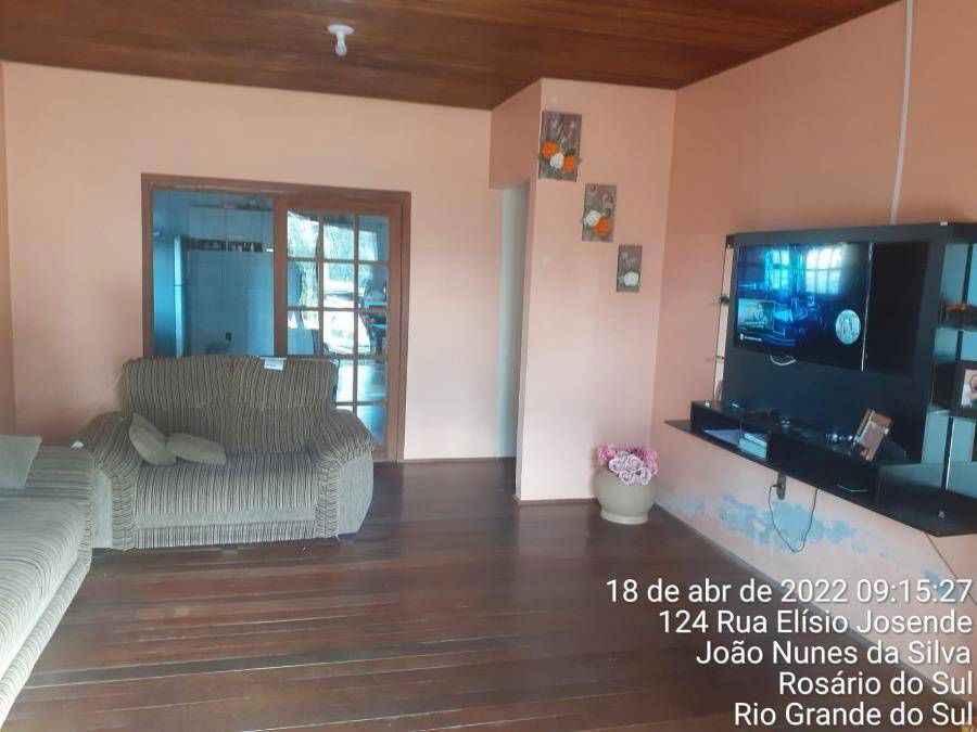 Casa com 200m² terreno e 300m² construída, ocupada