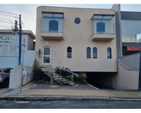Prédio misto com 5 quartos e 7 banheiros