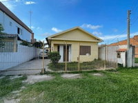 Casa com 3 dormitórios, 3 banheiros e 127,89 m² de área construída, ocupada