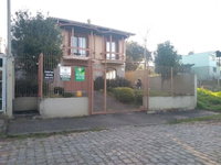 Casa com 3 dormitórios, 3 banheiros e 294,76 m² de área construída, ocupada