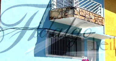 Casa residencial com 2 vagas, área construída 93,71m², ocupada