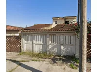 Casa ocupada com 50,29 m² de área construída