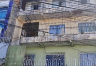 Casa com 77m² construída e terreno, 2° andar, ocupada