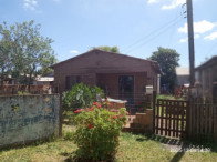 Terreno de 342m² com duas casas de alvenaria