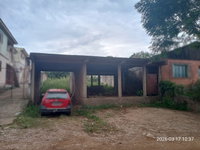 Edificação inacabada com 540,32m² de terreno no Bairro Laranjeiras