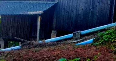 Casa de madeira com terreno de 5.195m²