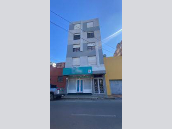 Sala comercial ocupada com 48,58m² no Centro de Pelotas