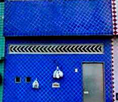 Casa em Guarujá com 4 construções geminadas