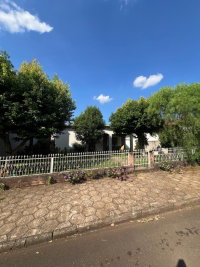 Lote Urbano de 495m² com Edificação em Alvenaria
