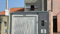 Casa com 156 m² de área construída, ocupada, com 3 quartos e 2 banheiros