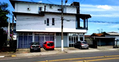 Terreno em Lages com 719m² e Construção de 799m²