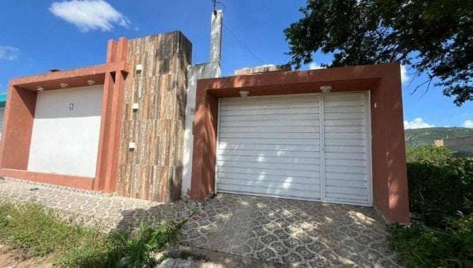 Casa com 3 quartos, 3 banheiros e 1 vaga de garagem, 124 m², ocupada
