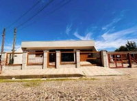 Casa com 3 quartos e 143m² de área construída, ocupada