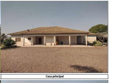 Fazenda ocupada com casas, piscina e galpão de 1.100 m²
