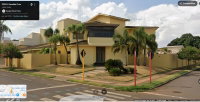 Terreno urbano com casa residencial de 2 pavimentos, 4 suítes, piscina e área de lazer