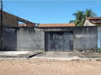 Casa ocupada com 128m² construídos em terreno de 302m²
