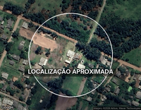 Terreno com Casa em Condomínio
