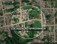 Terreno com 4 peças nos fundos