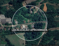 Terreno urbano com 24.400m² e três edificações antigas
