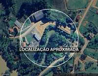 Terreno rural com casa de madeira em Ibirama