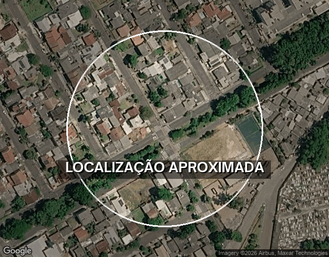 Terreno com construção de alvenaria em Esteio