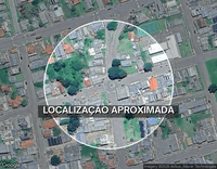 Terreno urbano com casa de madeira, 6.875m², ideal para investimento