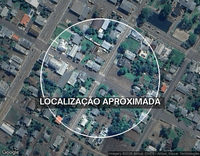 Lote urbano de 120m² com edificação em madeira