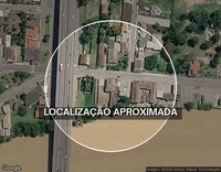 Terreno com edificação de 561m² no Centro de Tijucas