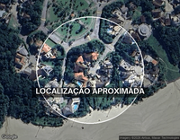 Casa em Bertioga com terreno de 373m² e sobrado em mau estado