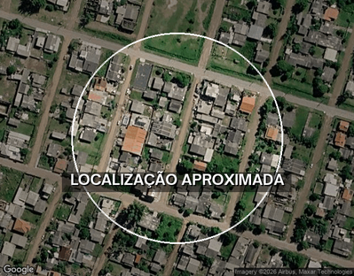 Terreno Urbano com Casa de Madeira