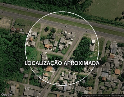 Terreno urbano com edificação residencial